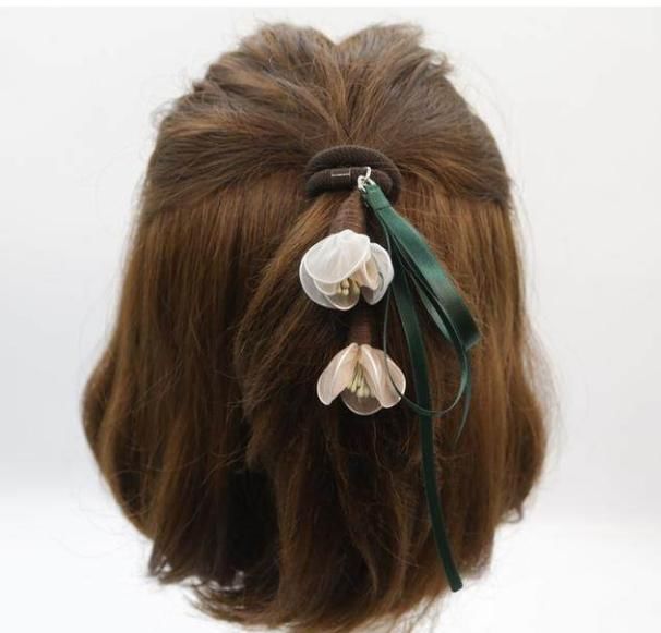 半丸子头已out了，今年流行这款发型，明星款清爽好看又有女人味