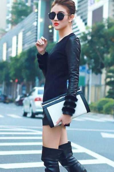 街拍:穿小吊带出街的都市美女,白皙如凝脂,一看就不爱晒太阳!