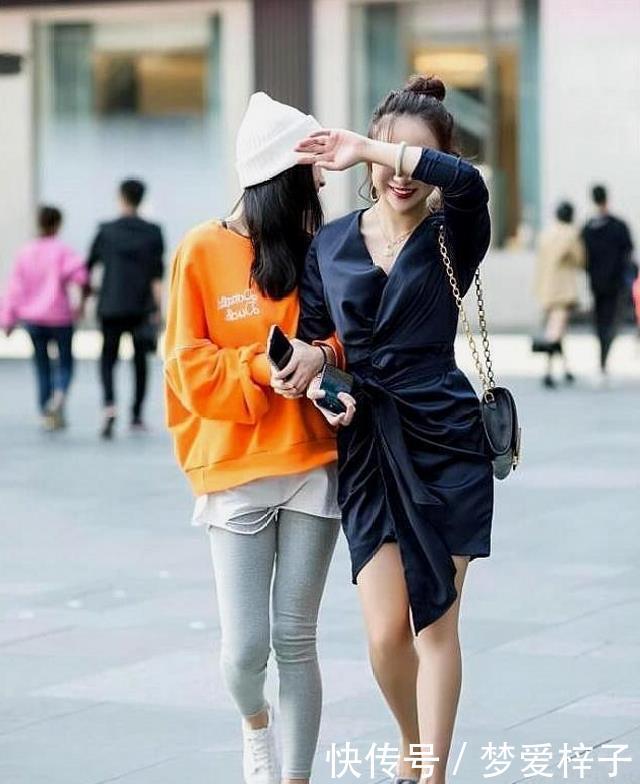 「迷人」路人街拍,靓女十分优雅迷人,穿黑色的西装裙,更加楚楚动人
